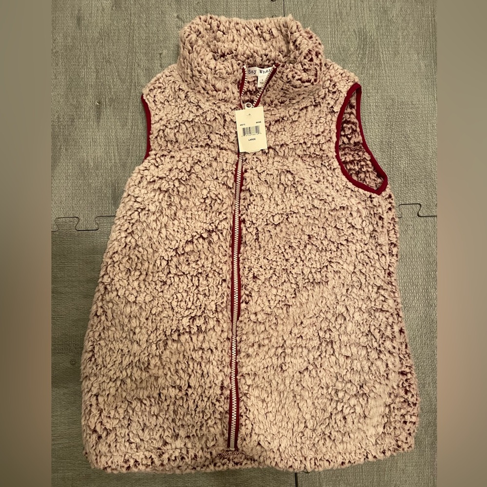 Women’s “say what?” Zip up Sweater vest, super soft! New with tag. Size large.